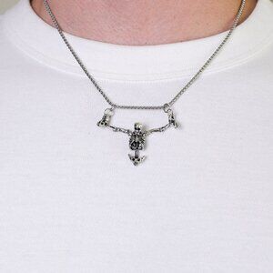 y2k style silver skeleton prisoner pendant necklace